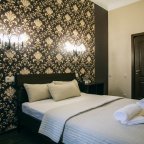 Кровать в номере Стандартный двухместный в гостевом доме Sellingroom