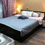 Спальная зона в номере Комфорт в отеле Багет