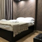 Кровать номера 9 в отеле Renvills Hotel