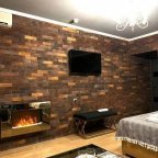 Зона отдыха в номере 10 Loft большой в отеле Renvills Hotel