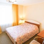 Кровать в номере DBL в отеле Suite Hotel