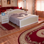 Кровать в номере Вип в отеле EURO сауна