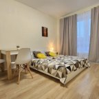 Двуспальная кровать в номере 3 в The Loft Studio у метро Котельники