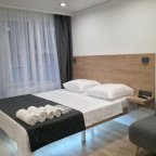 Комфорт трехместный №5 в отеле Buta Hotel 4
