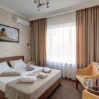 Кровать в номере Полулюкс Афродита в отеле Элитон Жулебино