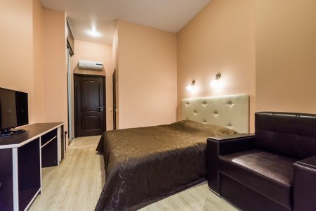 Интерьер номера Комфорт в отеле У капитана на Нагорной 