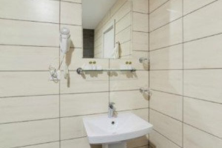 Раковина в номере Люкс в отеле Минима Кузьминки