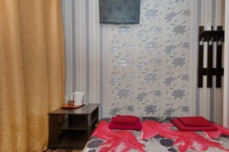Кровать в номере Стандартный двухместный в отеле Ладомир на Русаковской