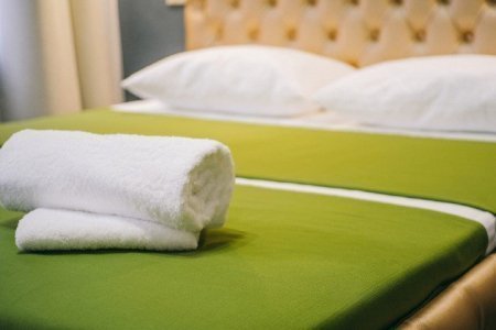 Кровать в номере Комфорт в Sellingroom