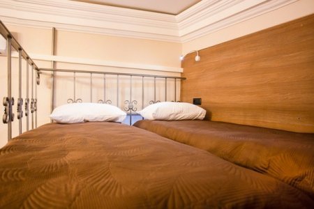 Бронь почасового номера в центре для свиданий Две кровати в номереСтандарт четырехместный с двухъярусной кроватью в отеле Базис-М