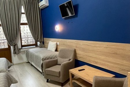Сюрприз для любимого — сутки в Базис-М, центр Москвы Зона отдыха в номере Комфорт четырехместный в отеле Базис-М
