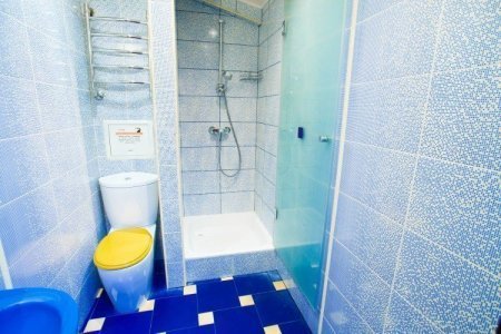 Душевая в номере  Полулюкс в отеле Тукан
