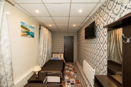 Две кровати в номере Стандарт 2-х местный в Ладомир на Садовом