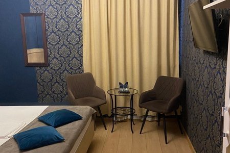 Кровать в номере Стандарт+ Фонтан в отеле Элитон
