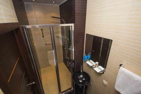 Душевая в номере Стандарт в отеле Ольховка