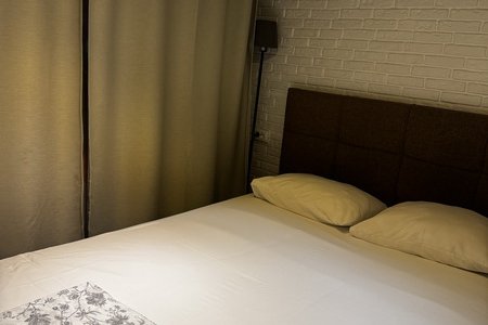 Большая кровать в номере Стандарт в отеле Лоренцо