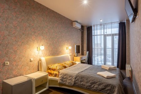 Кровать в Полулюкс в апартаментах на Хромова