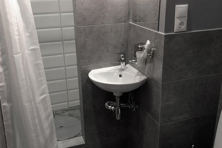 Душевая в номере Комфорт в отеле innGreyHotel