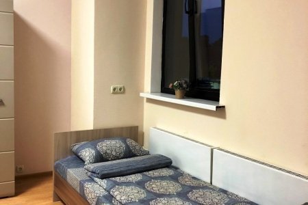 Кровать в номере Делюкс в отеле Flori Hotel