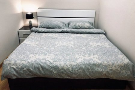 Кровать в номере Стандарт в отеле Flori Hotel