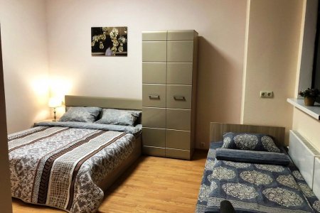 Кровати в номере Делюкс в отеле Flori Hotel