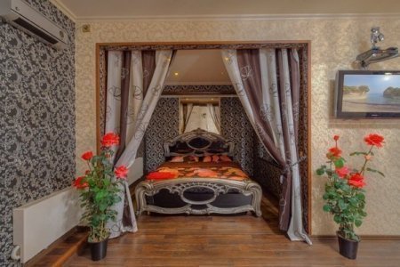 Кровать в номере 3 в Дионис