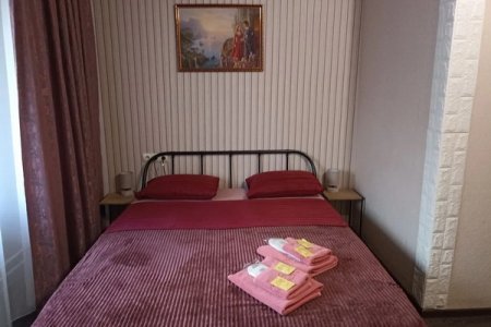 Кровать в номере Комфорт 3 в отеле Братислава