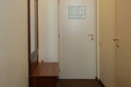 Дверь в номере Стандарт в отеле Golden Horse