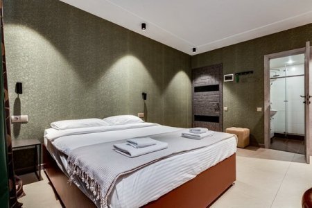 Кровать в номере 1 в отеле Renvills Hotel