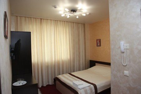 Кровать в номере Двухместный стандарт в отеле Амиго