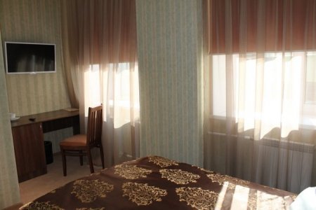 Интерьер в номере Стандарт в отеле Зима