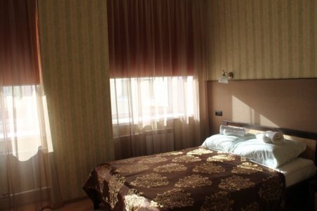 Спальное место в номере Стандарт в отеле Зима