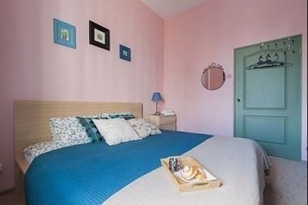 Номер с кроватью размера king-size в отеле Story Hostel