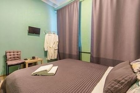 Спальное место в номере в отеле Story Hostel