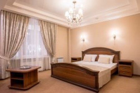 Кровать в номере Улучшенный в отеле Crystal
