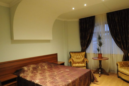 Кровать в номере Стандарт Дабл в отеле MALDINI SPA