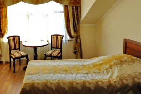 Кровать в номере Стандарт в отеле MALDINI SPA