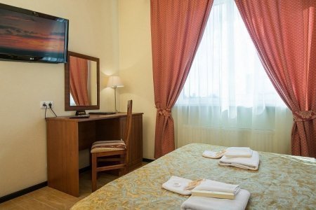 Интерьер номера Стандарт плюс в отеле Атлас
