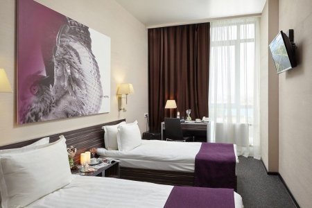 Две кровати в номере Стандарт в отеле City Hotel Sova