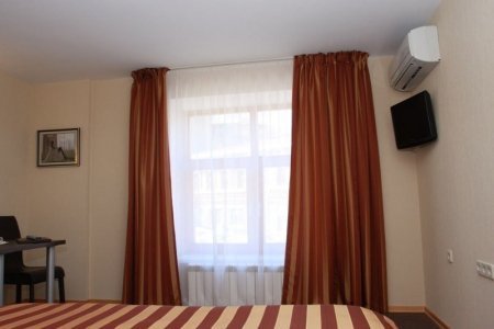 Снять отель Домино для влюбленных Кровать в номере Стандарт в отеле Домино