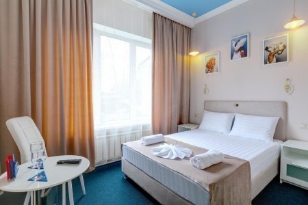 Кровать в номере Стандарт Ванильное небо в отеле Элитон Братеевская