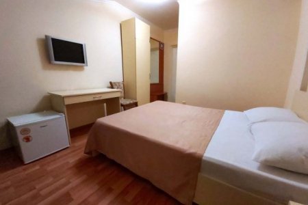 Недорогой отель Григ Ростов Спальная зона в номере Бюджет в отеле Григ