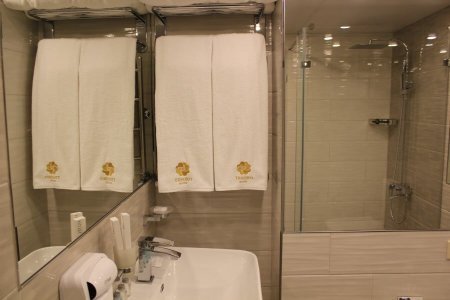 Отель Tesoro посуточно Полотенца в номере Комфорт в отеле Tesoro
