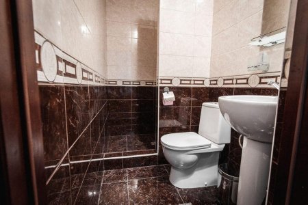 Санузел в номере Стандарт в отеле Кураж