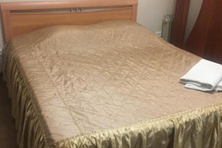 Кровать в номере  2 в отеле EURO сауна