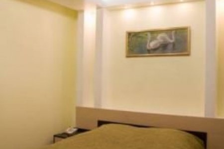 Кровать номера Люкс в отеле Млечный путь