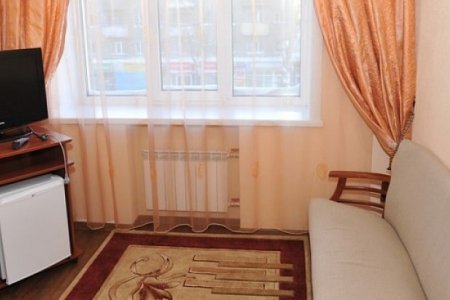 Забронировать номер для двоих Общий вид в номере Люкс в гостинице Северная