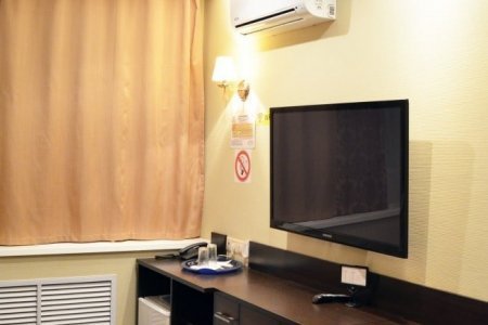 телевизор в номере Бизнес-комфорт в отеле Дукат