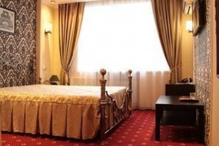 Забронировать номер для влюбленных пар Двуспальная кровать в номере Бизнес-Комфорт в отеле Дюна