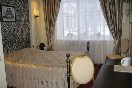 Забронировать номер для двоих Кровать в номере Бизнес-Комфорт в отеле Дюна